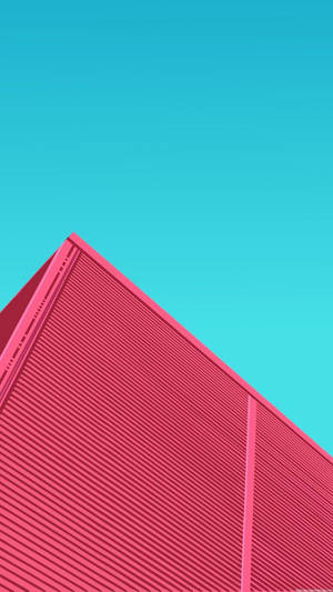 粉紅色幾何建築角落襯托藍綠色天空