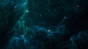 充滿活力的藍綠色和藍色星雲在佈滿星辰的宇宙空間中旋轉。