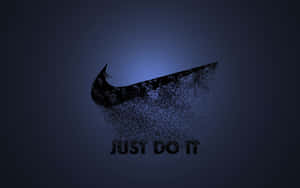 Nike 剔號標誌分解成粒子，並帶有「JUST DO IT」文字。