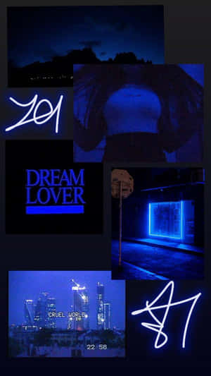 藍色霓虹拼貼畫，文字 dream lover 和 cruel world，背景為夜景城市和山景。