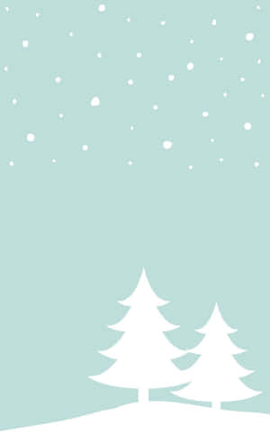 積雪山丘上的兩棵白色松樹，薄荷色天空下飄雪。 — 冬天 壁紙