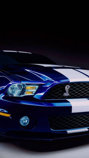 藍色Shelby Cobra跑車帶白色條紋（工作室燈光） — 汽車 壁紙