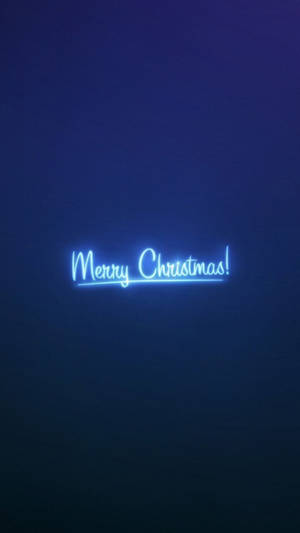 深藍色背景上寫著 Merry Christmas 的霓虹燈牌 — 聖誕節 iPhone 壁紙
