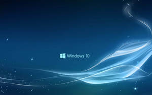 Windows 10 標誌，帶有流動的光波和星狀閃光，背景為藍色漸變。