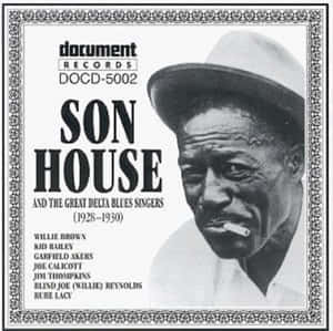 Son House 戴軟呢帽和香煙的復古專輯封面肖像。