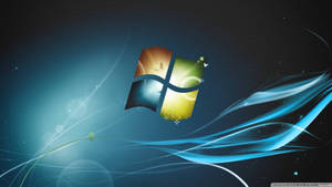 Windows 標誌被流動的藍色光線包圍，背景為深色。 — 藝術 壁紙