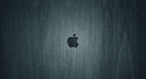 拉絲金屬背景上的Apple標誌