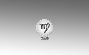 銀色圓圈中的處女座星座符號，下方有VIRGO字樣。