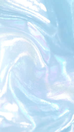 漩渦狀虹彩藍色布料，帶柔和全息高光。 — 藍色美學 壁紙