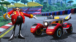 Dr Eggman 在色彩繽紛的賽道上與他的紅色賽車合影。