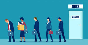 求職者從一扇標有「JOBS CLOSED」的關閉門走開。
