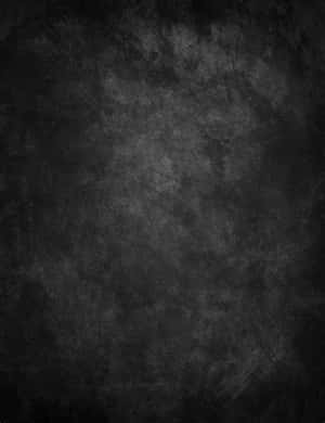 帶有污跡和刮痕的深色紋理黑板表面。 — 灰色 GIF 壁紙