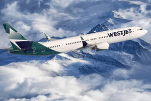 西捷航空飛機飛越雪山和雲層。