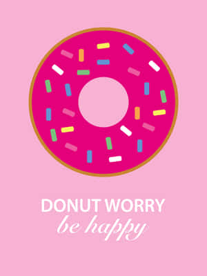 粉紅色甜甜圈配彩色糖粒，文字寫著 donut worry be happy。