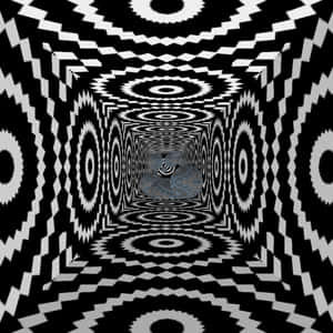 黑白幾何隧道，重複圖案通向中央的石球。
