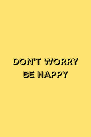 黃色背景上帶有粗體黑色勵志文字「DON'T WORRY BE HAPPY」