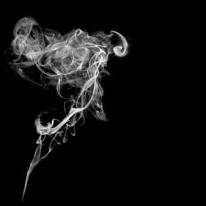 白煙在黑色背景上動態旋轉飄移。 — 音樂美學 壁紙