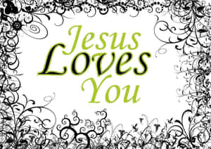 白色背景上，綠色文字帶黑色花卉邊框的「Jesus Loves You」文字