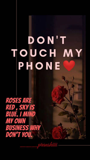帶有「DON'T TOUCH MY PHONE」和一朵紅玫瑰的文字壁紙。