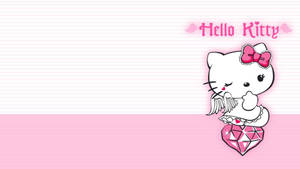 Hello Kitty 帶著天使翅膀坐在粉紅色鑽石上。