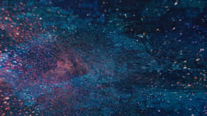 充滿活力的宇宙星雲，星星在藍色和洋紅色中旋轉，映襯著紋理筆觸背景。 — 抽象藝術 壁紙