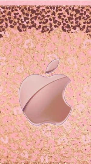 玫瑰金Apple標誌在粉紅和金色豹紋閃亮背景上。