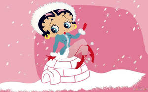 Betty Boop 穿著冬季服裝坐在雪地粉紅景觀中的冰屋上。