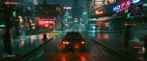一輛汽車在夜晚駛過下雨的霓虹燈賽博朋克城市。