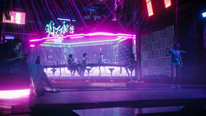 未來風格的 cyberpunk 酒吧，配有霓虹燈和發光吧檯前的顧客。 — Jugo GIF 壁紙