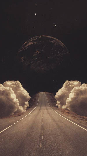 一條穿過雲層的道路通往夜空中的巨大行星。