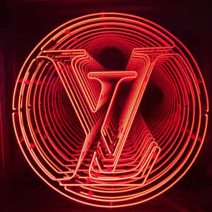 發光圓圈隧道中的紅色霓虹 Louis Vuitton 標誌。