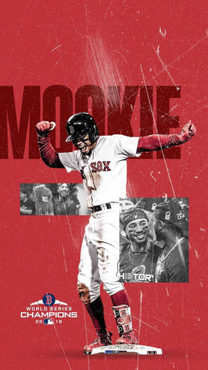 棒球選手 Mookie Betts 穿著波士頓紅襪隊球衣慶祝 2018 年世界大賽勝利。