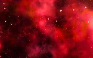 深邃太空中帶有閃爍星星的紅色宇宙星雲。
