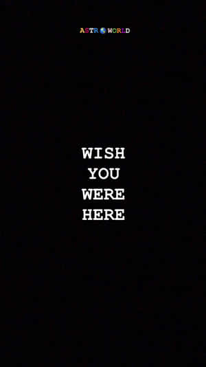 黑色背景，白色文字寫著 wish you were here，頂部有一個細小標誌。