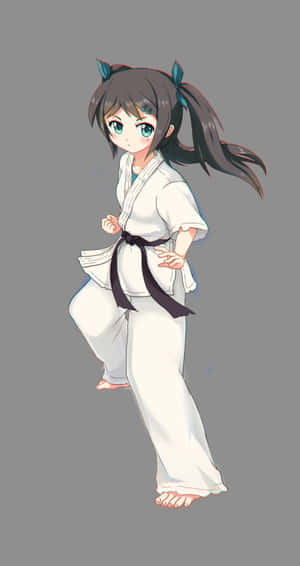 身穿白色空手道道服、黑色腰帶、藍色髮帶的動漫女孩擺出戰鬥姿勢。 — Pixel Fold 壁紙