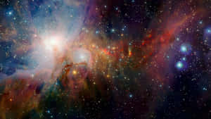 在深空中帶有發光氣體和星星的充滿活力的宇宙星雲。