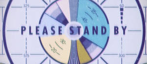 復古雷達屏幕，帶有「PLEASE STAND BY」文字和彩色分段。