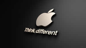 Apple標誌帶有「Think different」口號，在深色漸變背景上。