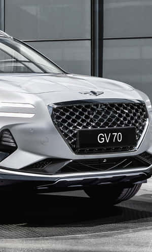 銀色 Genesis GV70 SUV 正面視圖 現代環境 — Galaxy Tab A 壁紙