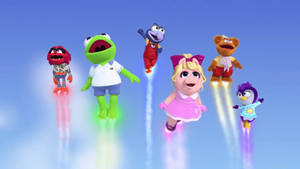 Muppet角色乘坐噴射背包飛越藍天。 — 綠野仙蹤 GIF 壁紙