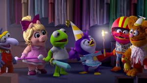 Muppet 角色穿著戲服在後台用煙花慶祝。 — 布公仔大電影 GIF 壁紙