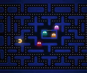 Pacman 在藍色迷宮中穿梭，四個鬼魂追趕著他。