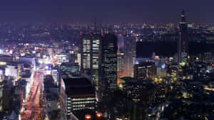 東京夜景，燈光璀璨，高樓林立。