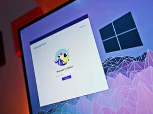 顯示器顯示帶有彩色幾何背景的Microsoft Teams歡迎頁面。