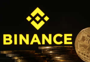 金幣堆疊，背後有發光的 Binance 標誌。