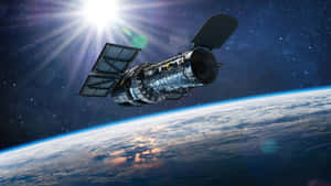 地球軌道上的衛星，陽光照耀，星星可見 — 精細 壁紙