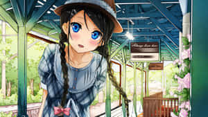 藍眼睛和辮子的動漫女孩在火車站與粉紅色的花朵。