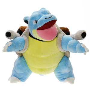 一個藍色和黃色 Blastoise 毛絨玩具，張大嘴巴，伸出雙臂。
