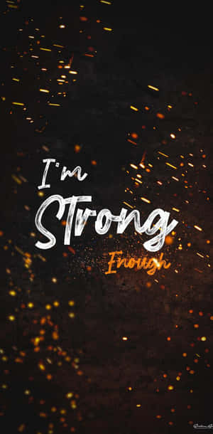 勵志名言 I'm Strong Enough，深色背景上帶有金色火花