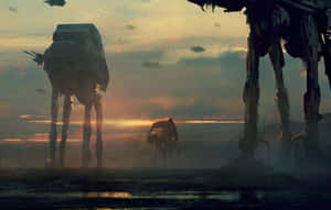 三部 AT-AT 步行機在沙漠行星上以剪影姿態映襯日落。